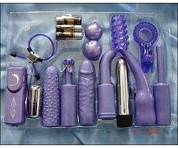 Вибронабор DreamToys из ПВХ пурпурный: 7 насадок и вибратор