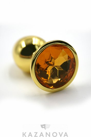 Анальная втулка Kanikule металлическая золотая малая с оранжевым стразом